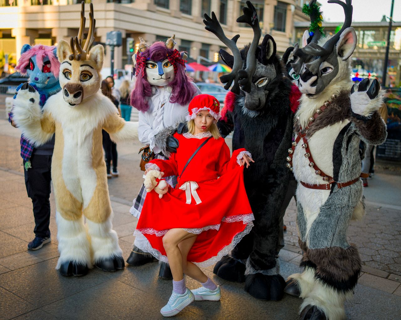 Group of people in cosplay costumes pose in downtown San Jose, California.